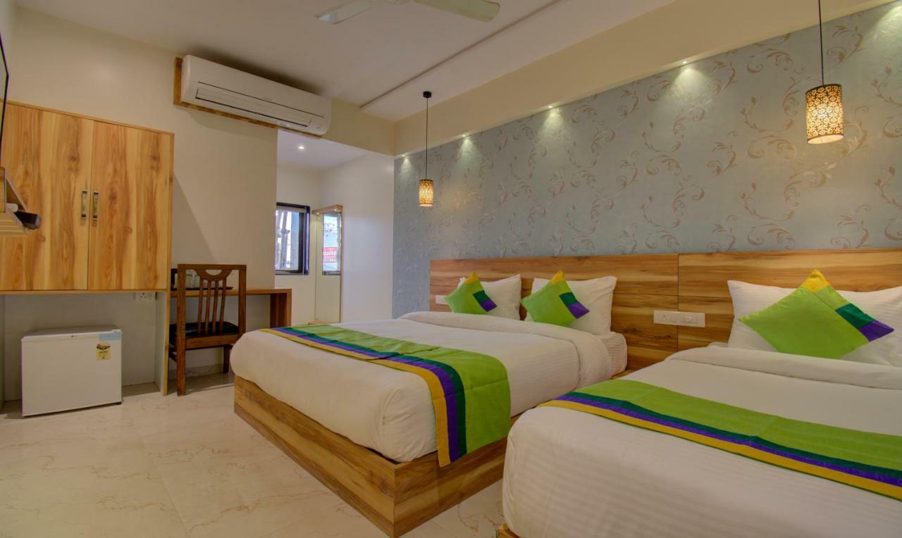 Hotel Amisha International Surate Extérieur photo