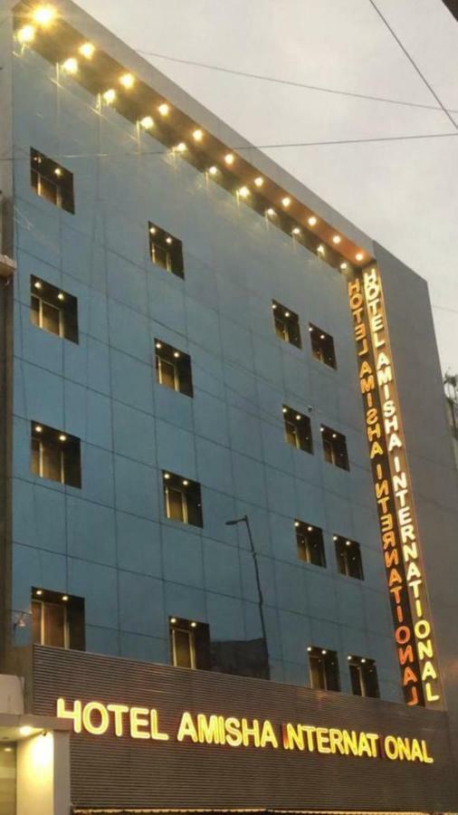 Hotel Amisha International Surate Extérieur photo